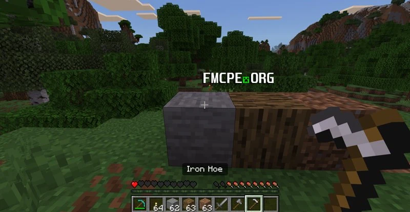 Trying to destroy a stone with a hoe