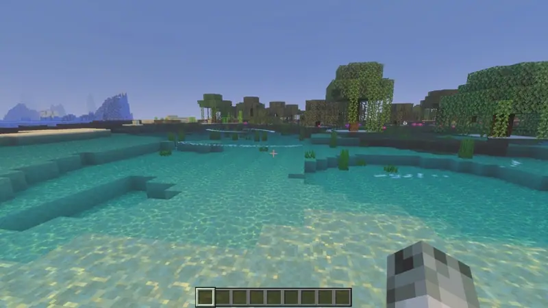 The quiet water surface is now disturbed by incoming waves.
